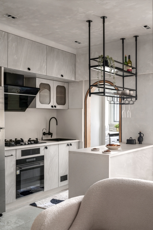 Small Kitchen Layout with Ceiling Mounted Storage Rack