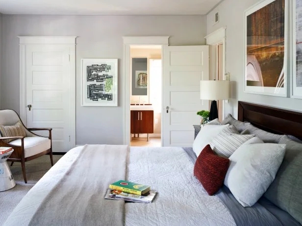 Small Master Bedroom Layout with Ensuite View and Mid-Century Chair