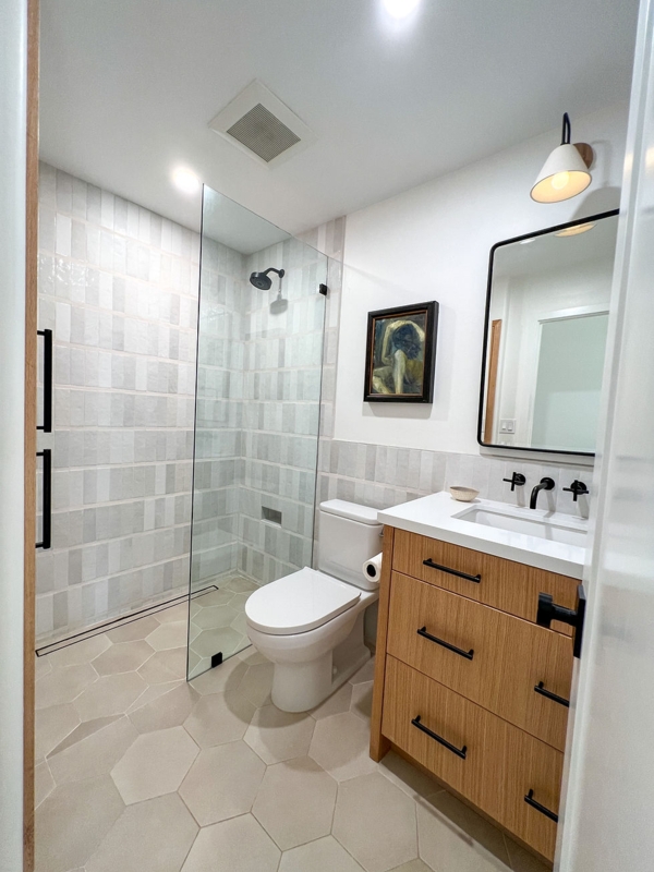 Small Modern Bathroom with Vertical Stack Tile and Hexagonal Floor