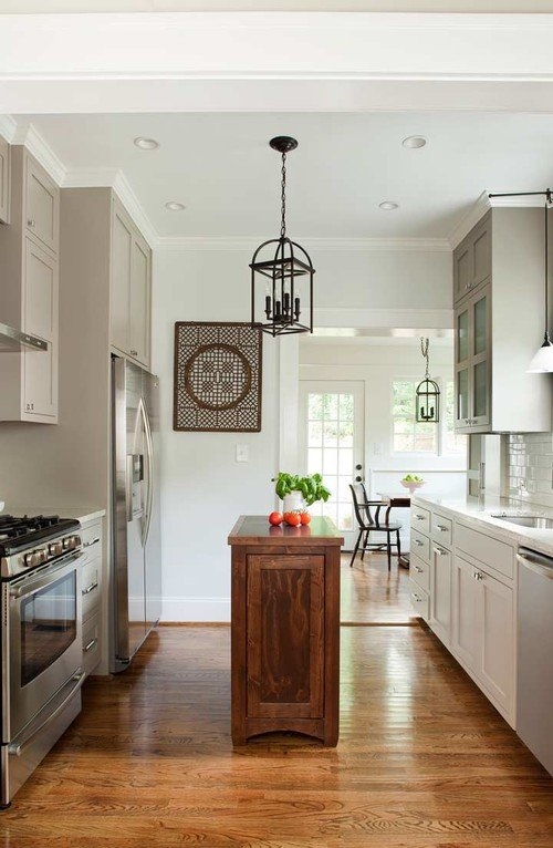 Small Neutral Kitchen Design with Dark Stone Countertops