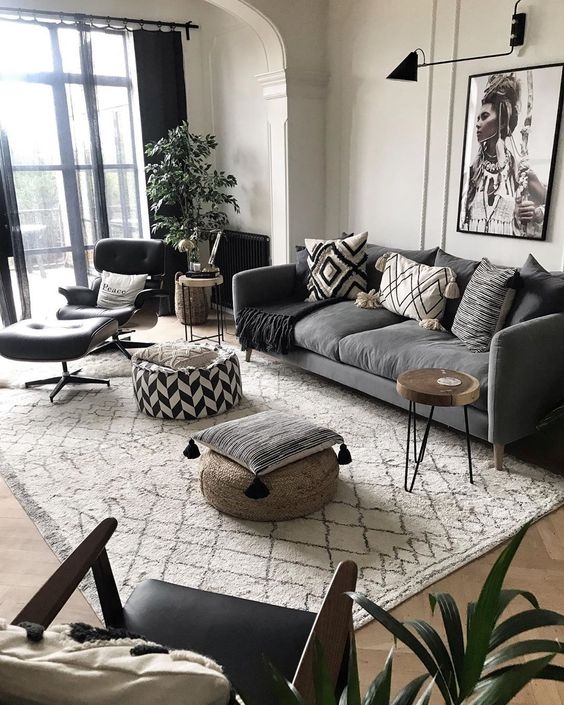 Sofa with Black Accents, Geometric Rug & Mid-Century Lounge Chair