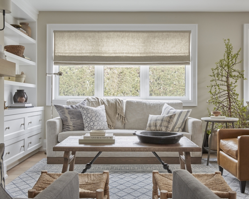 Sofa with Linen Roman Shade, Woven Stools & Rustic Wood Coffee Table