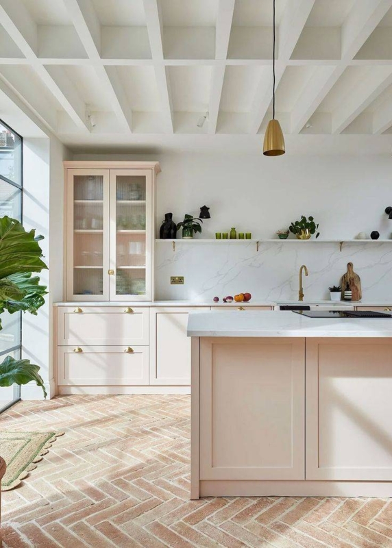 Sophisticated Kitchen: Herringbone Brick Floor and Pale Pink Cabinetry