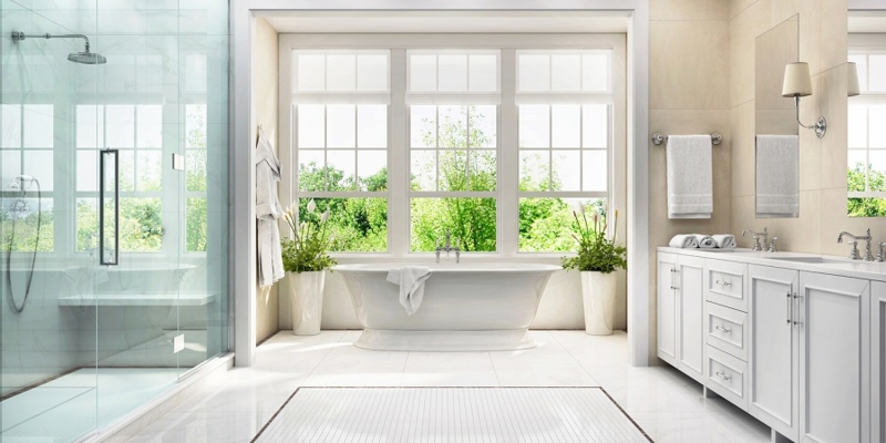 Spacious Master Bathroom: Tub Under Grid Windows & Shaker Vanity