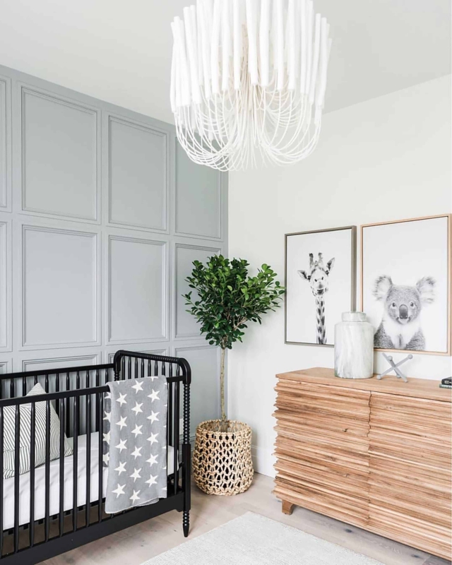 Spindle Crib in Modern Nursery with Grey Paneled Accent Wall