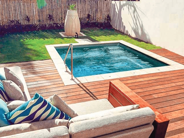 Square Plunge Pool Integrated into Modern Wooden Deck