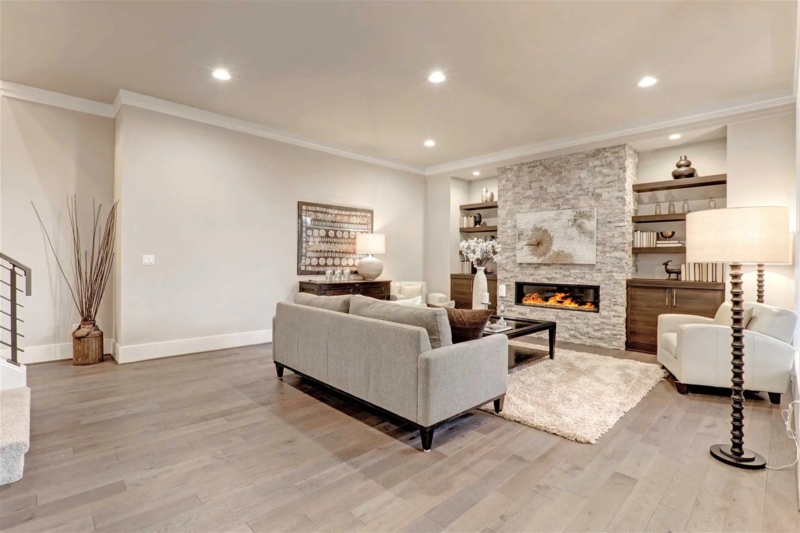 Stacked Stone Fireplace Wall with Recessed Built-In Shelving
