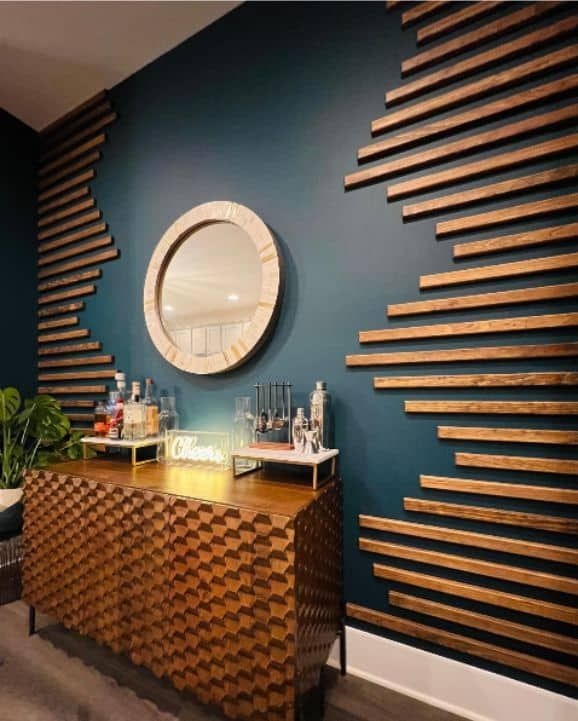 Staggered Wood Slat Accent Wall on Dark Teal Background