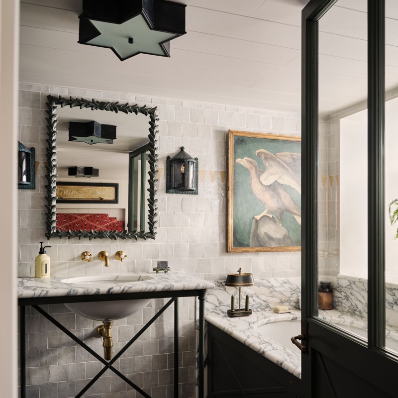 Star Shaped Light: Eclectic Bathroom with Marble X-Frame Vanity