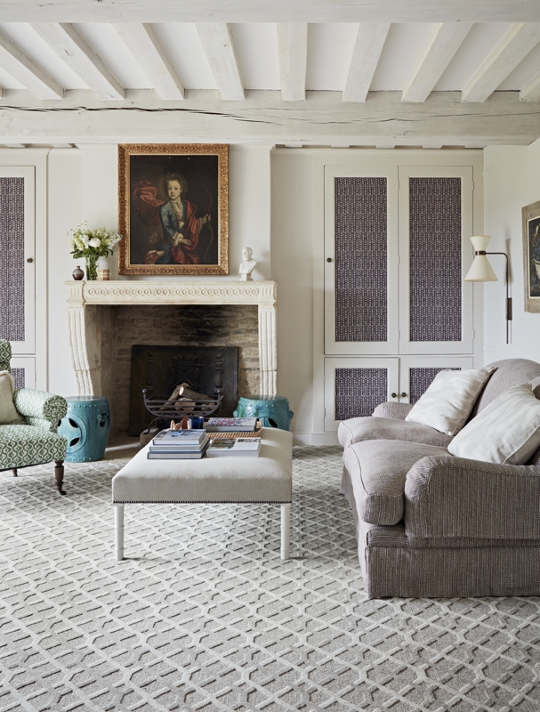 Stone Fireplace with Portrait Decor in a Rustic Refined Living Room