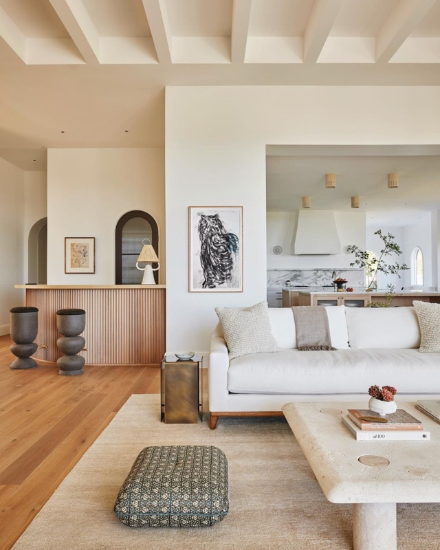 Stone-Like Coffee Table with Exposed Beams and Ribbed Paneling