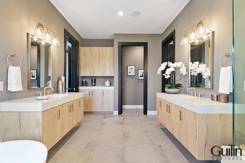 Stylish Organic Master Bathroom: Dual Floating Wood Vanities