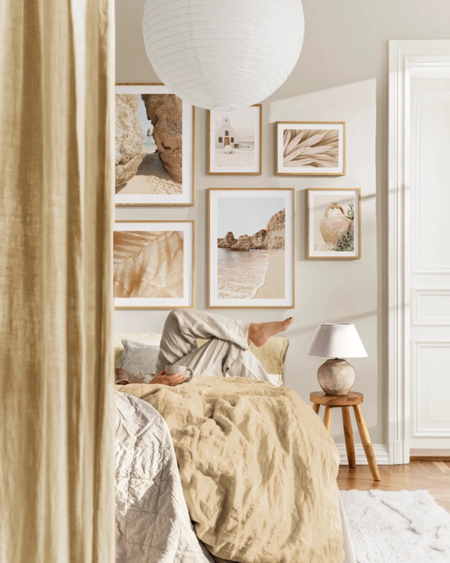 Sun-Kissed Bedroom with Yellow Bedding and Tonal Gallery Wall