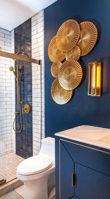 Sunburst Wall Decor in Luxurious Navy and Gold Bathroom Design