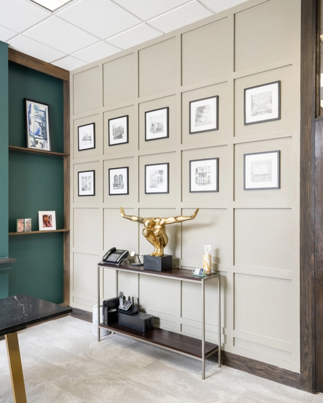 Symmetrical Gallery Wall on Taupe Square Grid Paneling