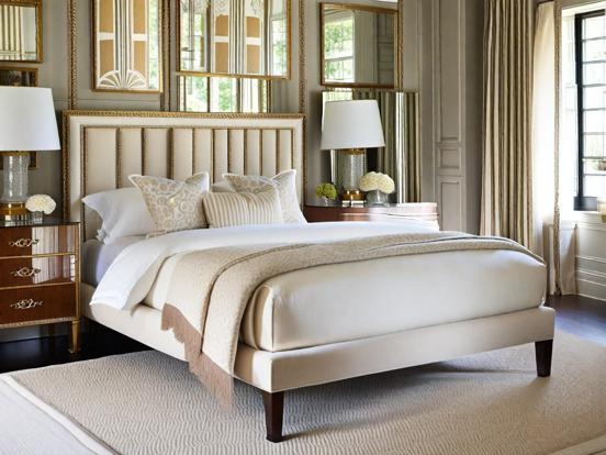 Tall Channel-Tufted Headboard with Mirrored Wall Panels and Gold Trim