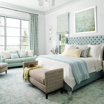 Tall Tufted Headboard Bed in Serene Blue and White Bedroom with Settee
