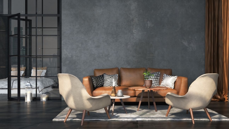 Tan Leather-Like Sofa with Black Metal Partition in Industrial Lounge