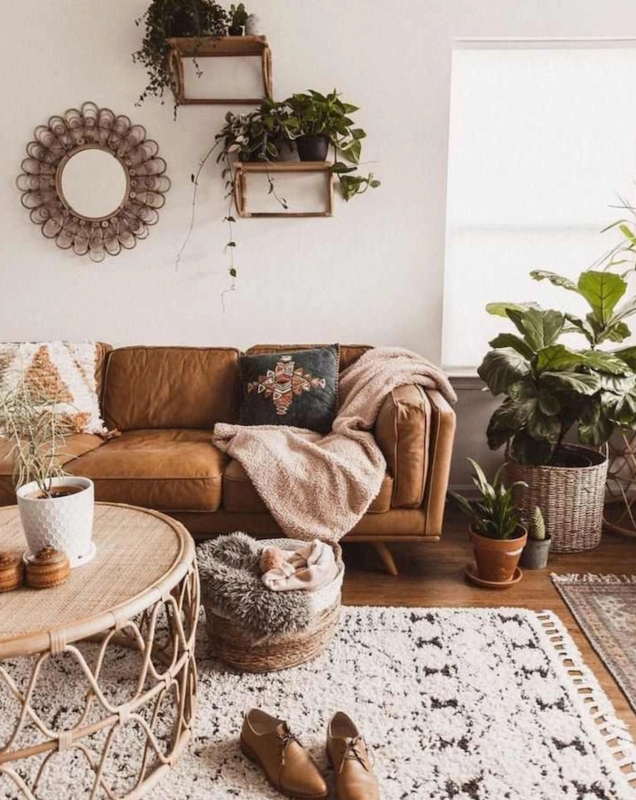 Tan Sofa with Rattan Base and High Pile Patterned Rug