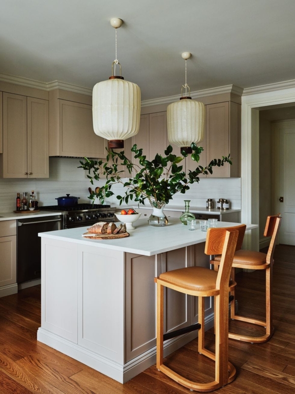 Taupe Kitchen Island Design with Lantern Pendant Lights & Wood Stools