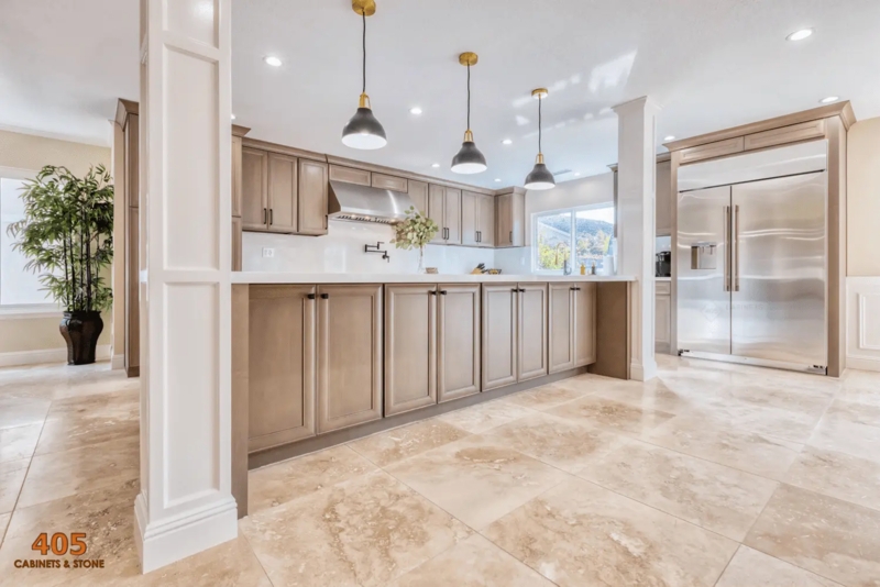 Taupe Shaker Kitchen Cabinets with Oversized Island & Large Tile Floor