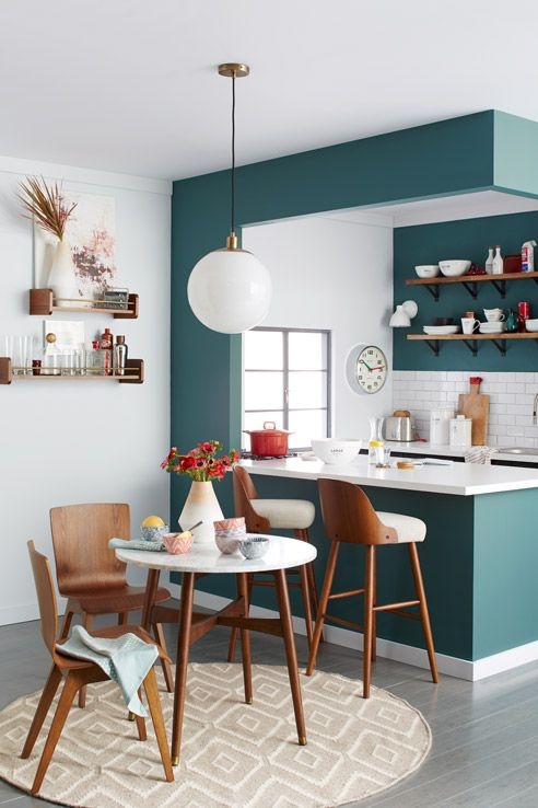 Teal Accent Wall Kitchen Ideas with Mid-Century Modern Dining Set