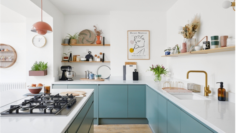 Teal Flat Panel Cabinets and Open Shelving with Gold Faucet