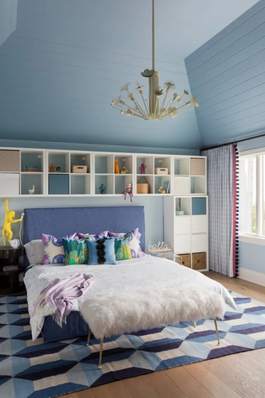 Teen Bedroom: Sloped Blue Plank Ceiling & Geometric Rug