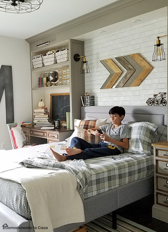 Teen Room with White Brick Accent Wall and Built-In Shelving Unit