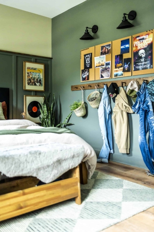 Teenage Bedroom featuring Olive Green Accent Wall and Peg Rail Storage