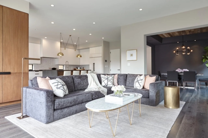 Textured Charcoal Sectional Sofa with Marble Oval Coffee Table and Gold