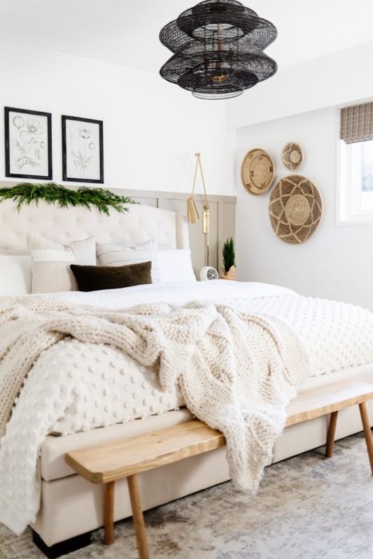 Tiered Black Pendant Light and Chunky Knit Throw in Farmhouse Bedroom