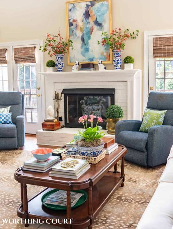 Tiered Coffee Table with Animal Print Rug and Blue Chinoiserie