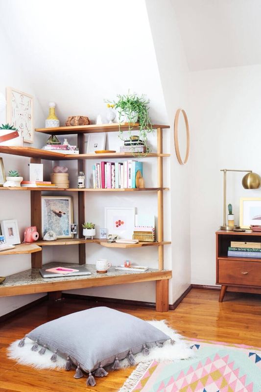 Tiered Corner Shelving with Floor Cushion Seating in Boho Bedroom