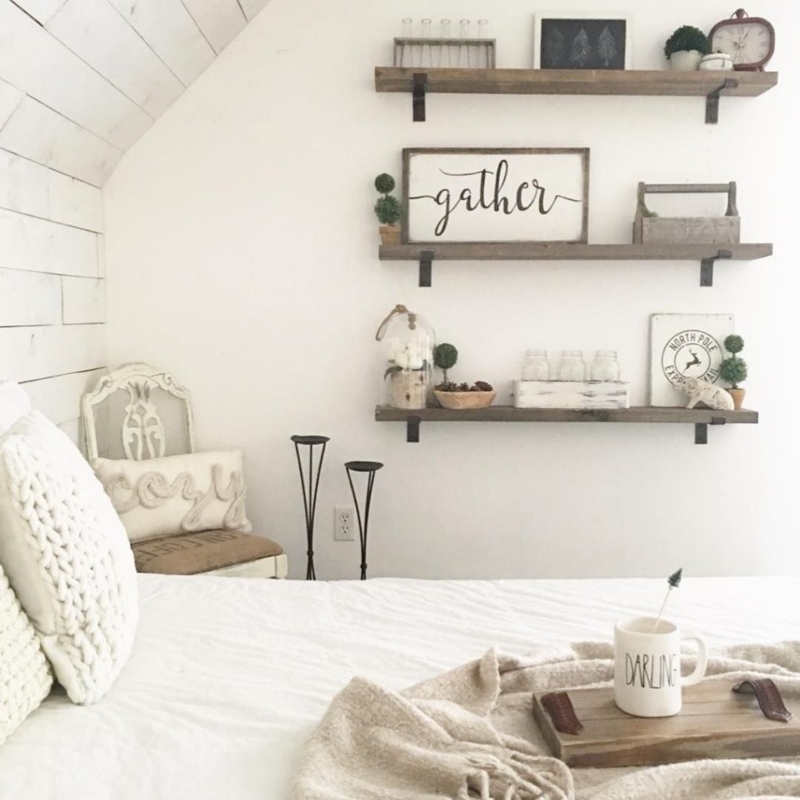 Tiered Rustic Wood Floating Shelves on White Shiplap Bedroom Wall