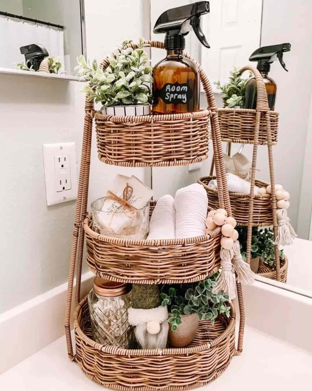 Tiered Stand in woven rattan with wooden bead accent. SEO: boho style vanity storage.