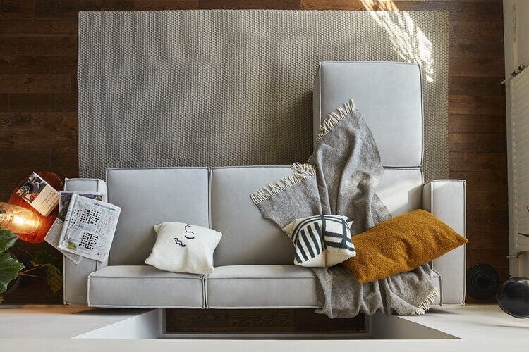 Top Down View: Contemporary Grey Sectional and Chunky Rug