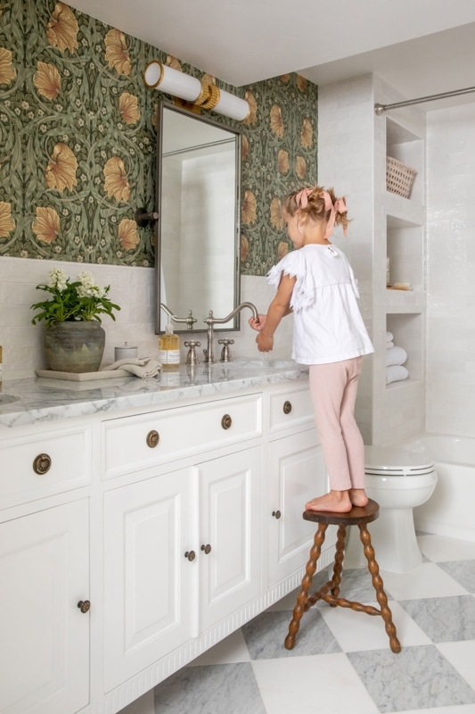 Traditional Bathroom with Botanical Wallpaper and Checkered Marble Floor