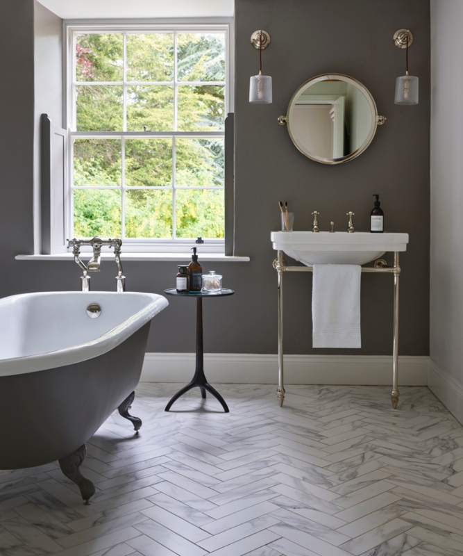 Traditional Bathroom with Marble Herringbone Floor and Clawfoot Tub