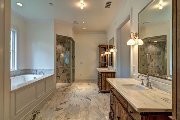Traditional Double Vanity Bathroom Layout with Marble Flooring