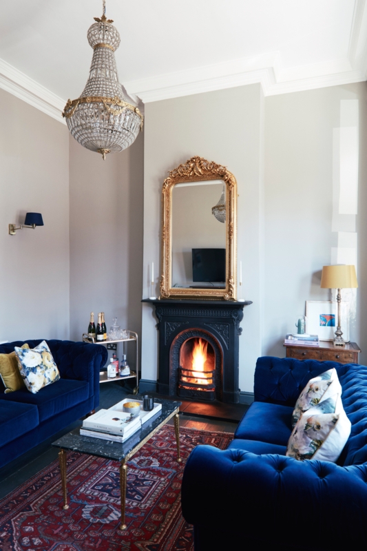 Traditional Glam Sofas with Ornate Gold Mantel Mirror