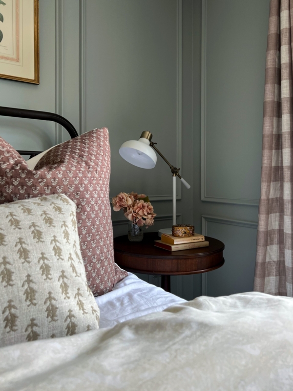 Traditional Guest Bedroom with Block Print Pillows and Gingham Curtains