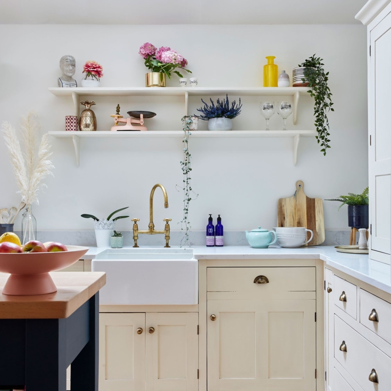 Traditional Kitchen with Farmhouse Sink, Brass Faucet, and Open Shelves