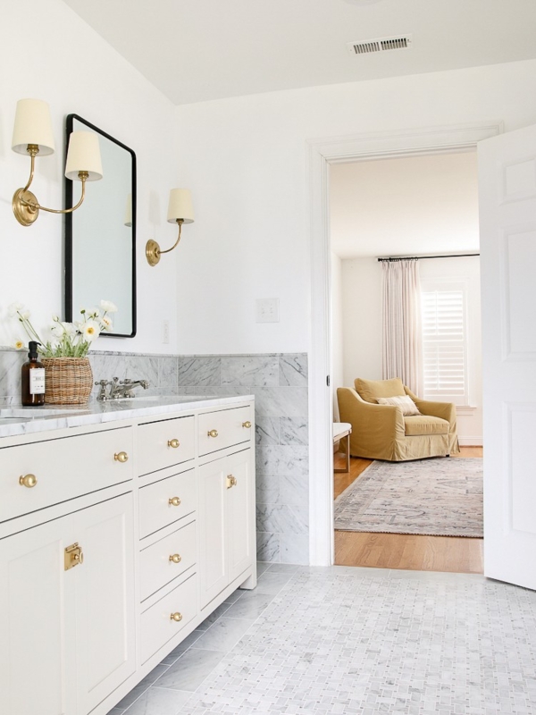 Traditional Master Bathroom With Basketweave Tile Floor And White Vanity