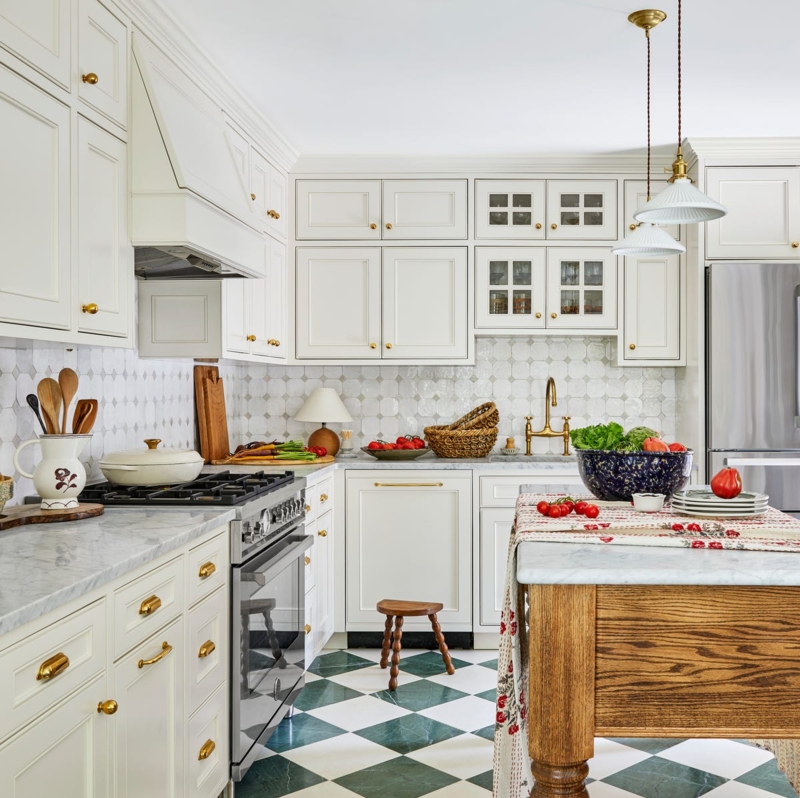 Traditional White Cabinetry with Green Checkered Floor & Wood Island