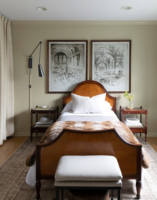 Traditional Wood Bed with Black Swing Arm Lamp and Sage Green Walls