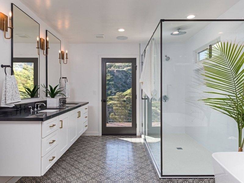 Transitional Bathroom Vanity with Black Countertop and Gold Hardware