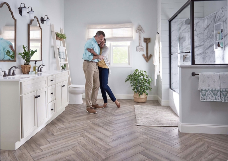 Transitional Bathroom With Herringbone Flooring And Black Framed Shower