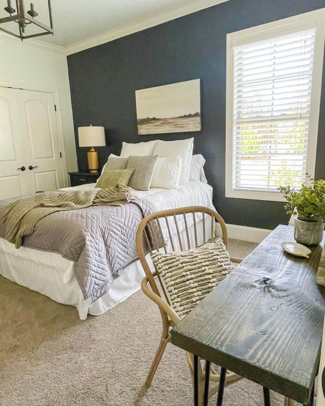 Transitional Bedroom with Navy Accent Wall & Rustic Wood Desk