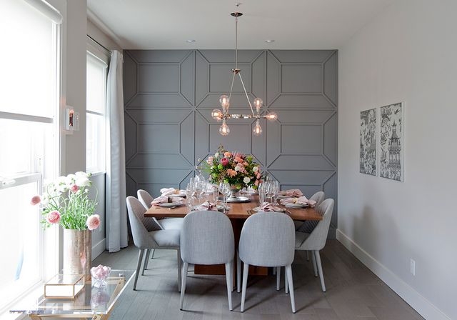 Transitional Grey Dining: Geometric Wall Paneling & Modern Chandelier